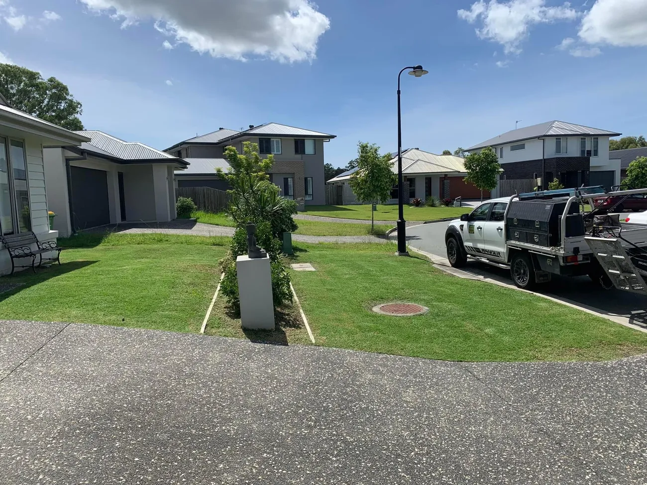 Freshly mowed new-build front lawn
